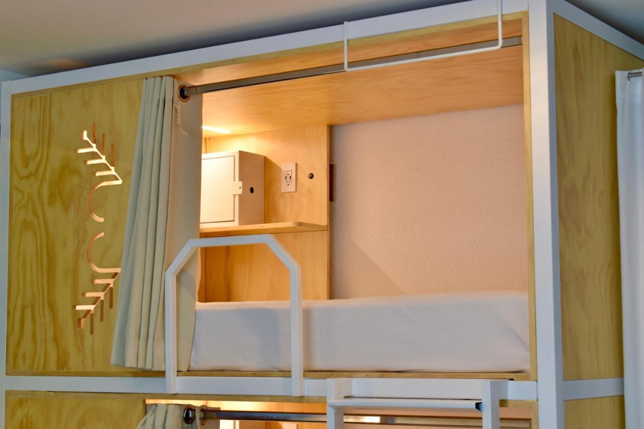 Cama en habitación compartida de 6 camas